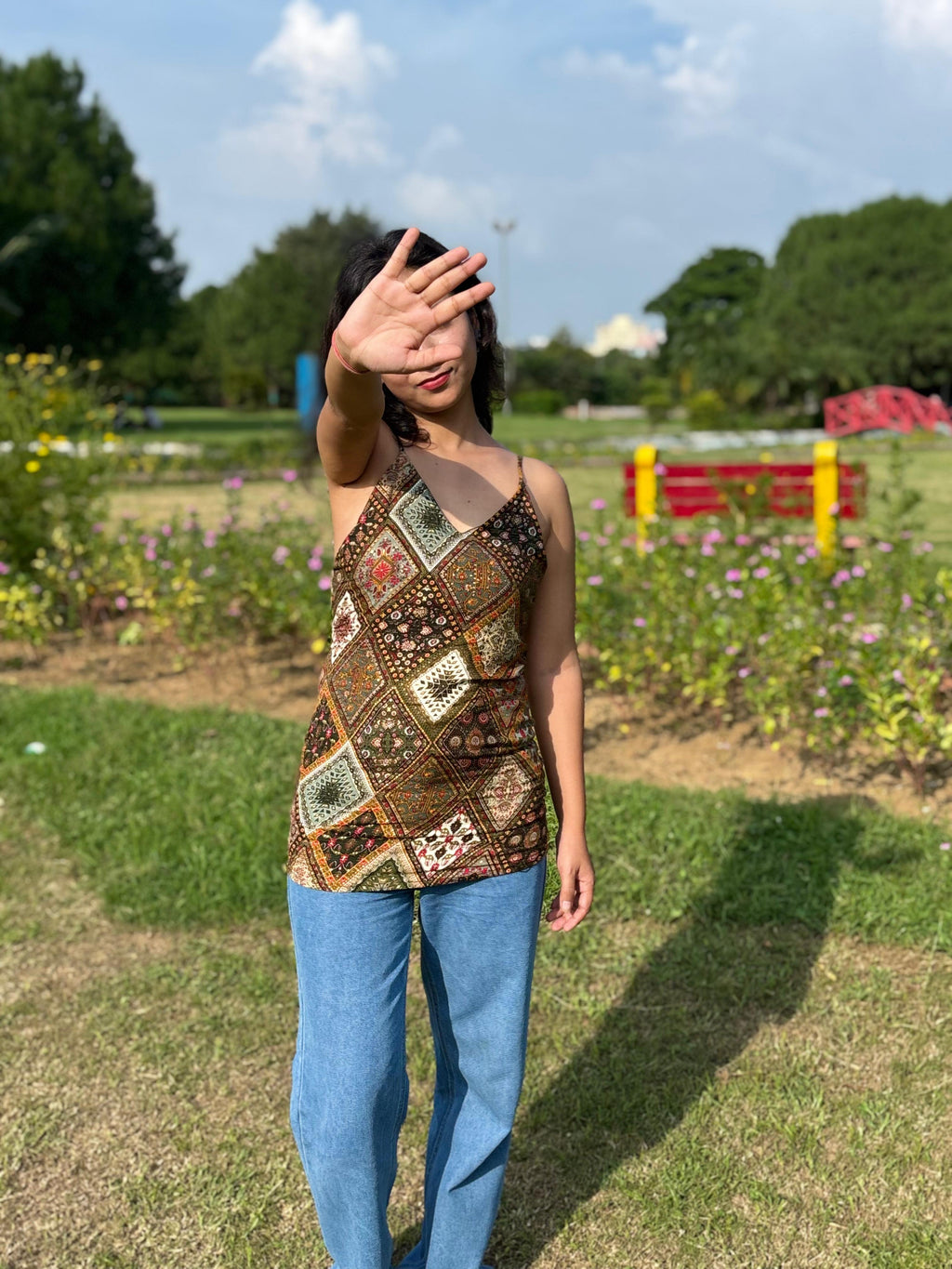 Aarvi - Sleeveless Multicolor Patch Print Short Kurti